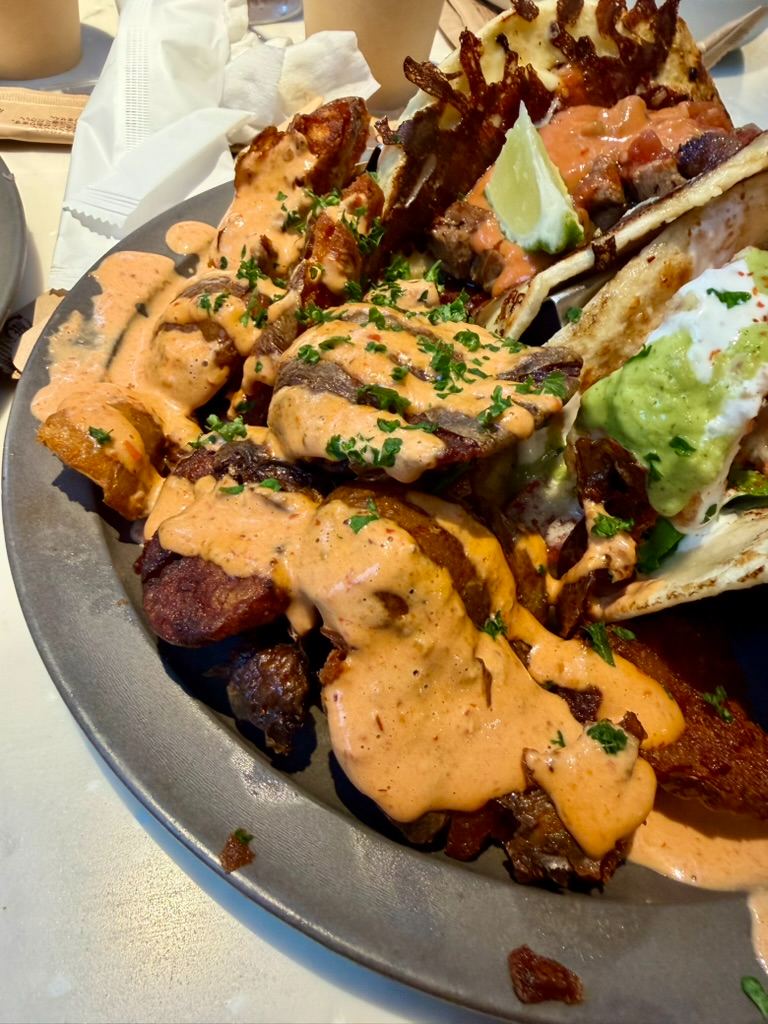 🌮 Squeezing Into Flavor: The Ultimate Loaded Tacos & Fries Feast at Blue Entrance Kitchen! 🍟🔥